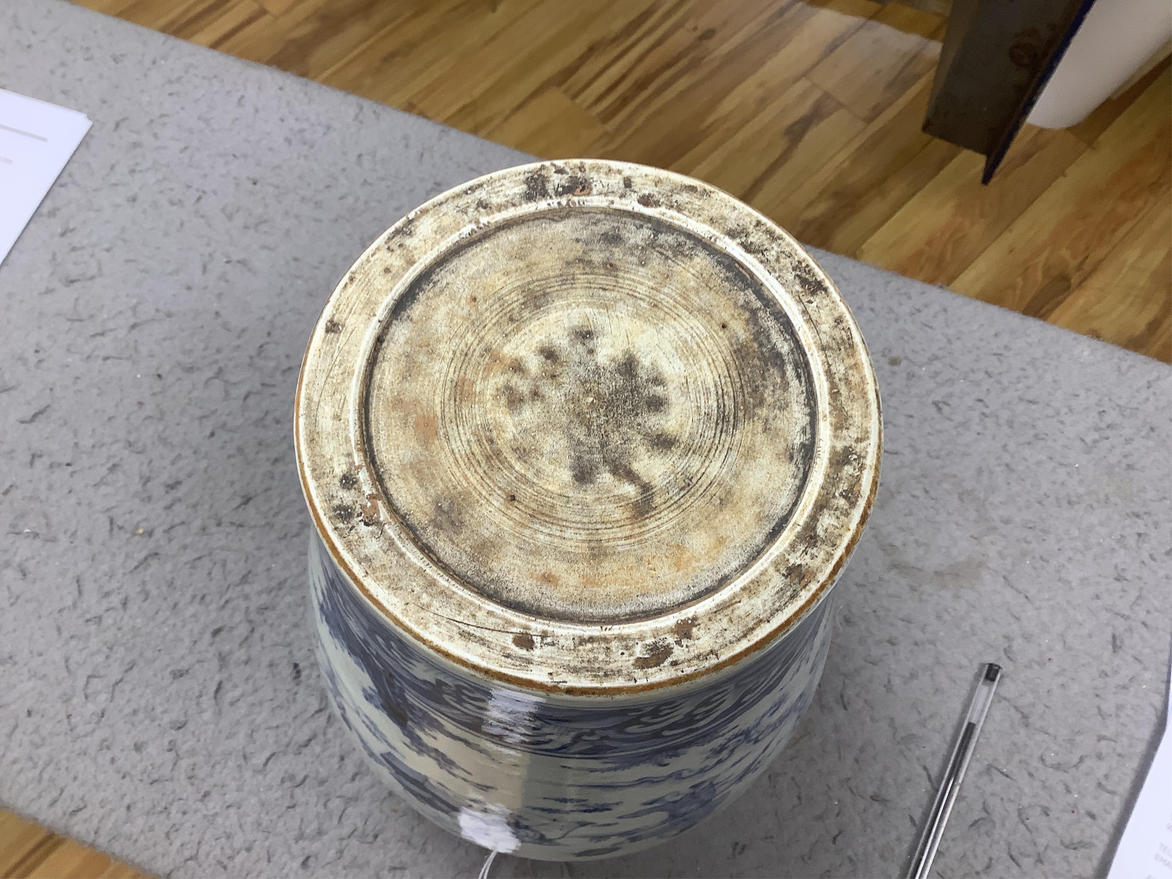 A Chinese blue and white vase, decorated with figures before a landscape, 31cm high. Condition - good